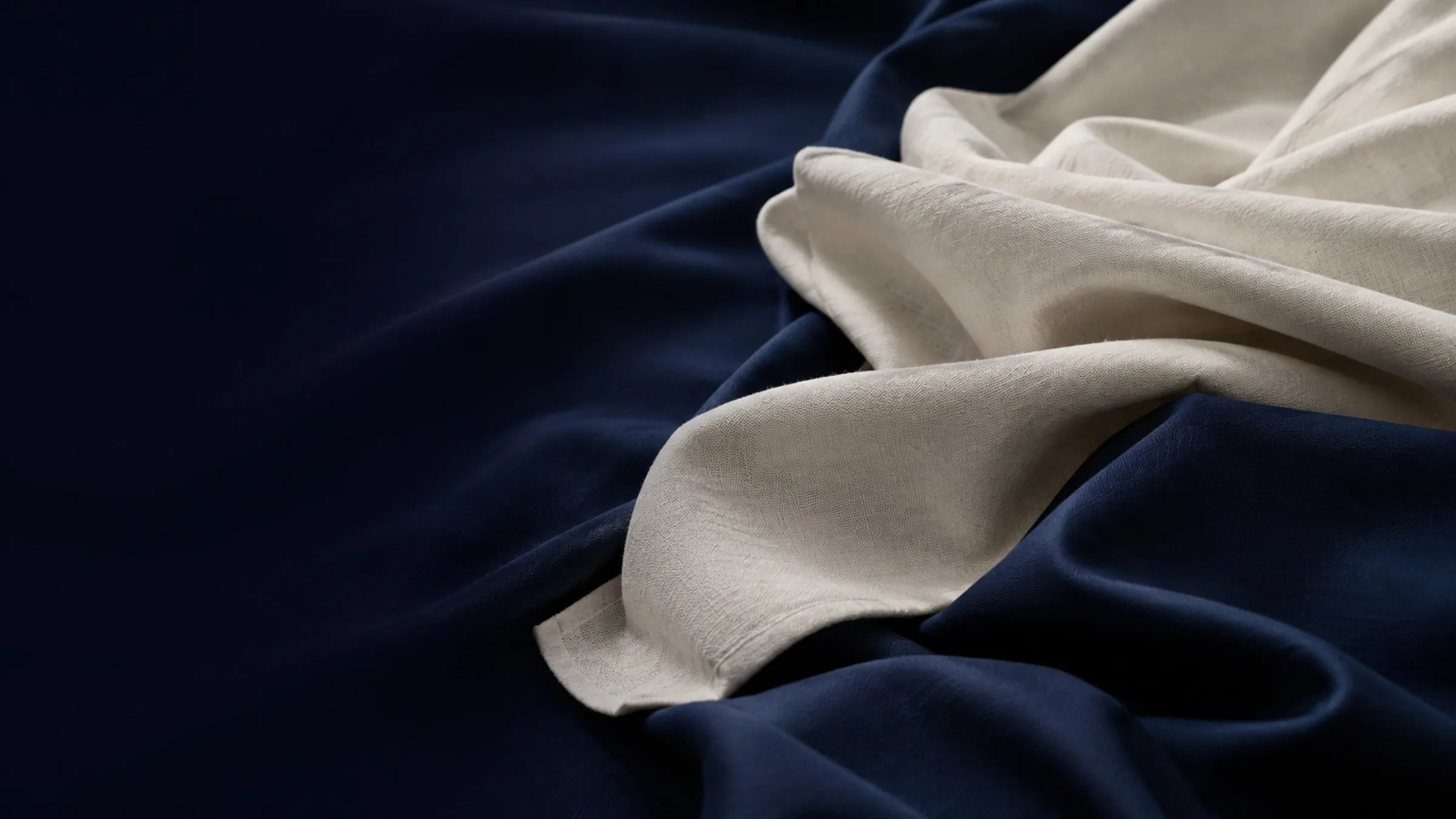 Navy and ivory fabric laid in soft folds